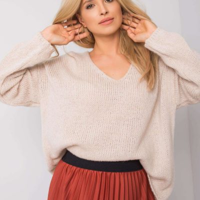 Beżowy sweter oversize
